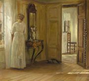 Interior with a Lady and a Cat (Interieur med kvinde og kat) - Carl Holsøe