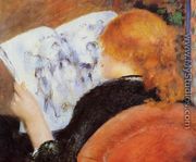 Young Woman Reading An Illustrated Journal - Pierre Auguste Renoir