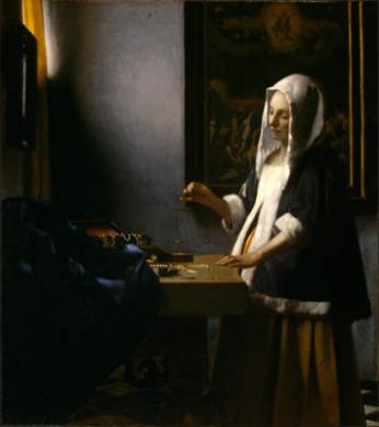 Woman Holding a Balance  1664