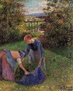 Women Gathering Grass - Camille Pissarro